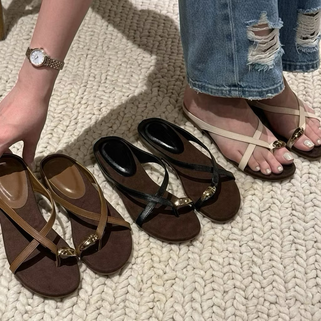 Round toe sandals with long straps pulled out at the back with beaded ...