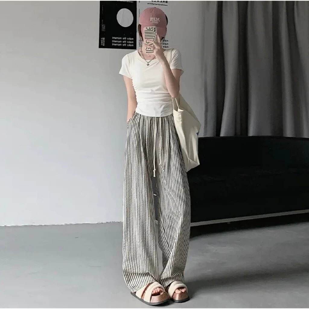 GETADME Blue-and-white plaid wide-leg pants women's early autumn design sense high waist loose drape small fresh casual slim pants.